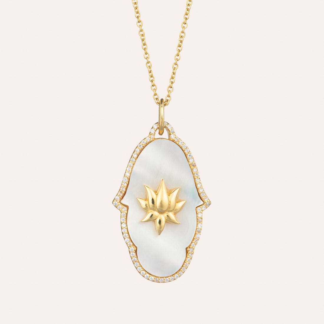 Sohavi Lotus Hand pendant with mother of pearl edged with sparkly cubic zirconia and lotus flower in sterling silver with 22k gold vermeil.